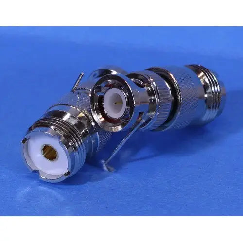 Shiny metal right-angle coaxial connector.