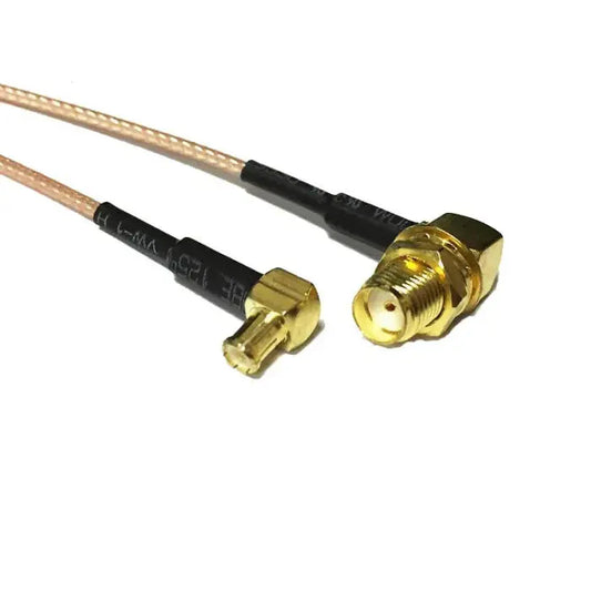 Coaxial cable adapter with gold-plated connectors on both ends.