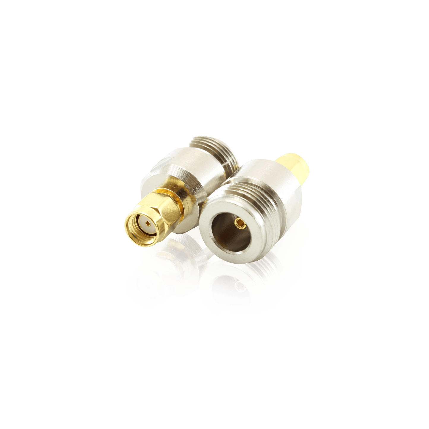 Four RF coaxial adapters with silver and gold-plated finishes.