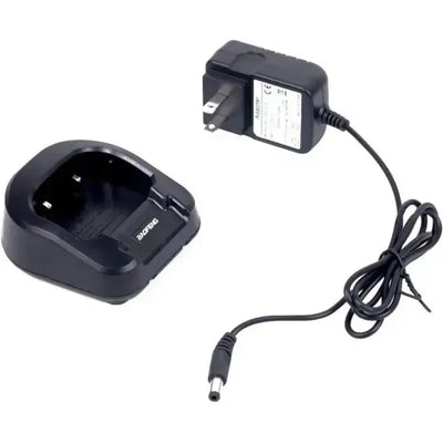 Black two-way radio charger and power adapter.