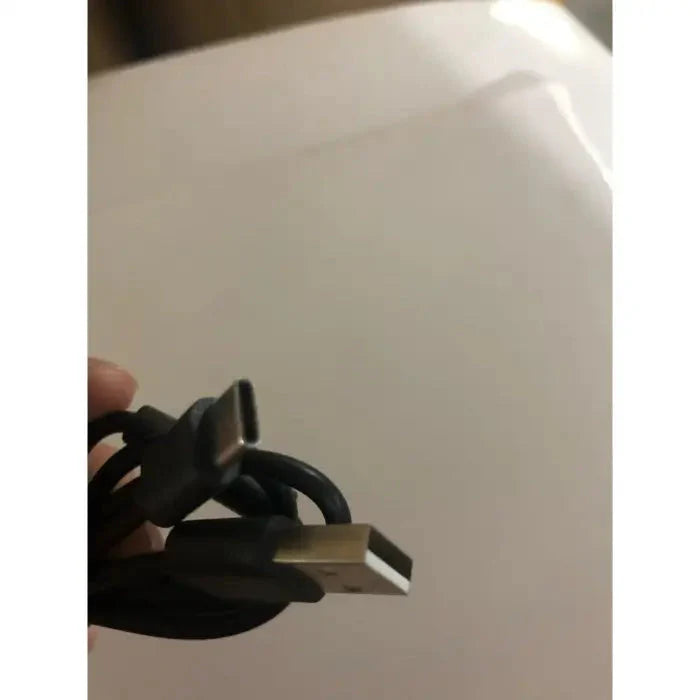 Black charging cable with USB and proprietary connector.