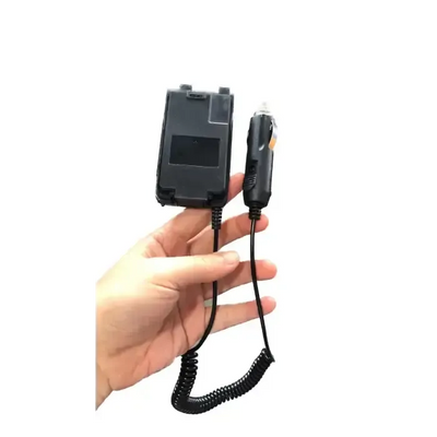 Black car charger with coiled cord.