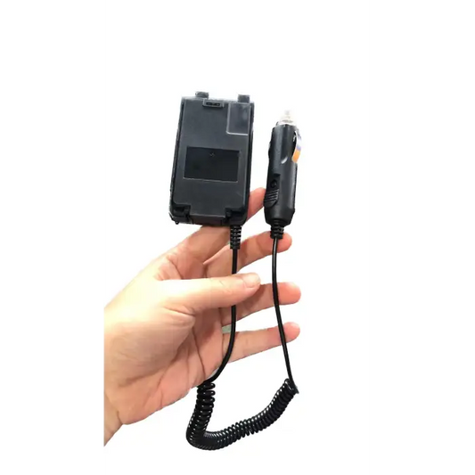 Black car charger with coiled cord.