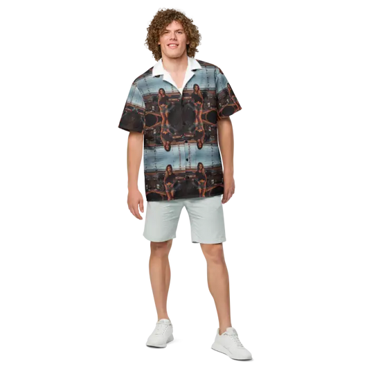 Man in patterned shirt and shorts.