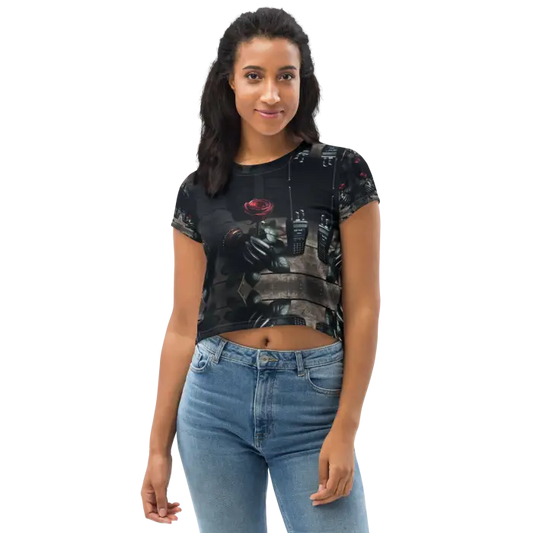 Woman wearing a printed crop top and jeans.