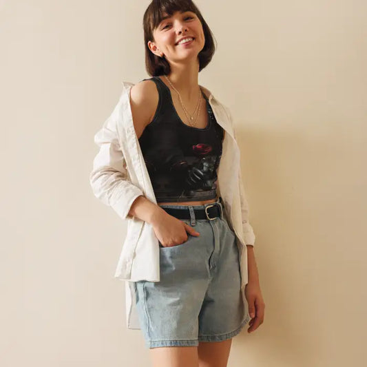 Smiling woman in casual summer outfit.