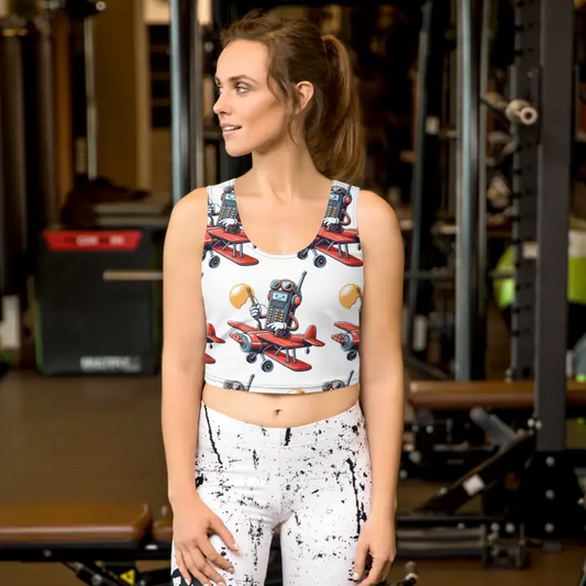 Woman wearing patterned crop top and leggings.