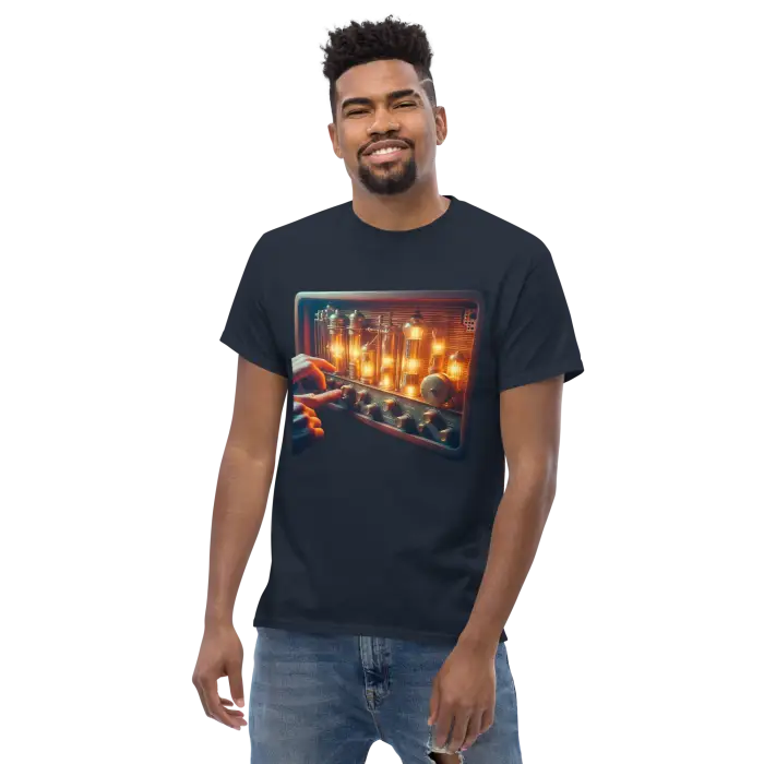 Man wearing a t-shirt with a vintage audio console graphic.
