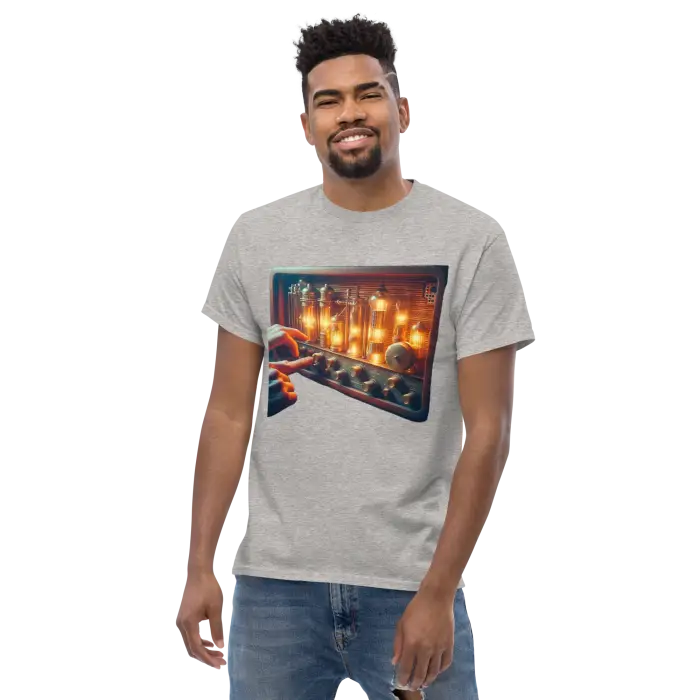 Man wearing a t-shirt with a vintage control panel graphic.