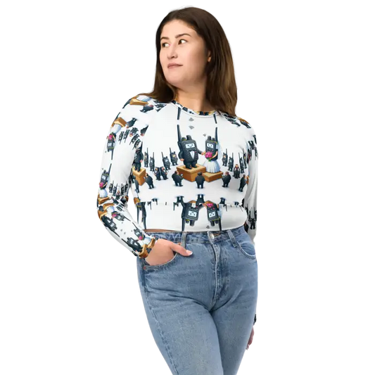Woman wearing a patterned long-sleeve shirt and jeans.