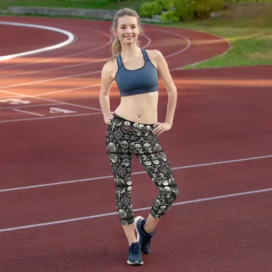 Woman in skull-patterned leggings.