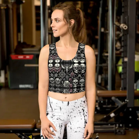 Woman wearing skull-patterned crop top.