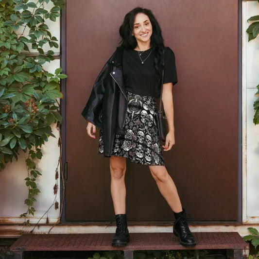 Woman in skull-patterned skirt.
