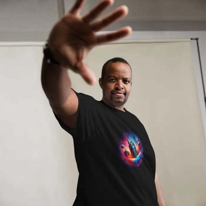 Black t-shirt with colorful space graphic.