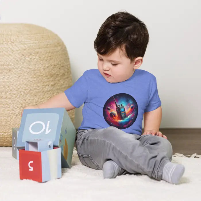 Child’s blue t-shirt with walkie-talkie design.