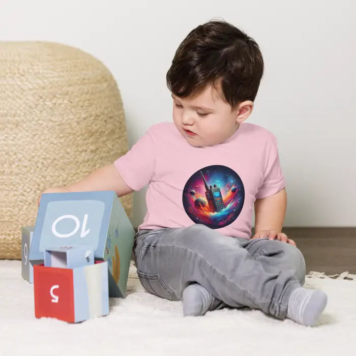 Child’s pink t-shirt with walkie-talkie graphic.