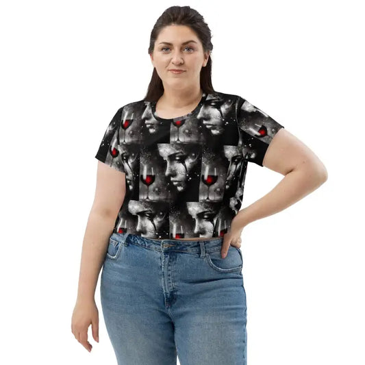 Woman wearing a patterned crop top and jeans.