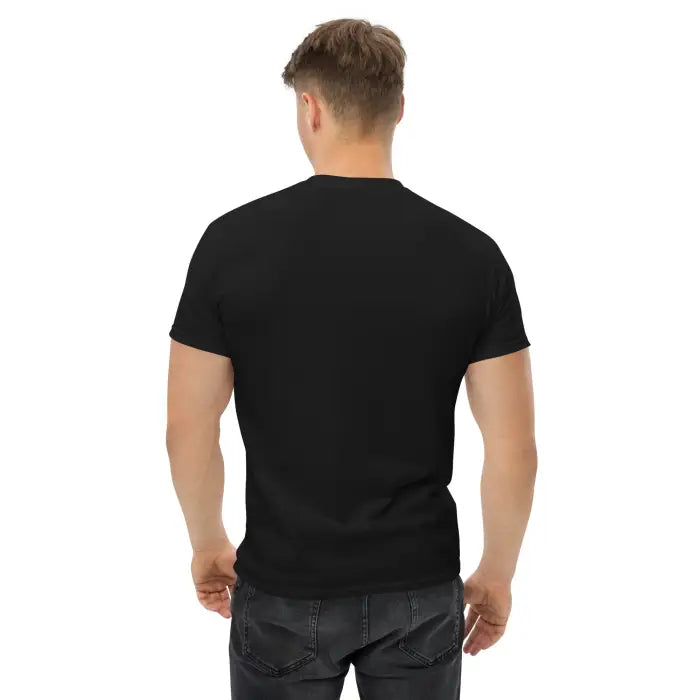 Black t-shirt on a person.