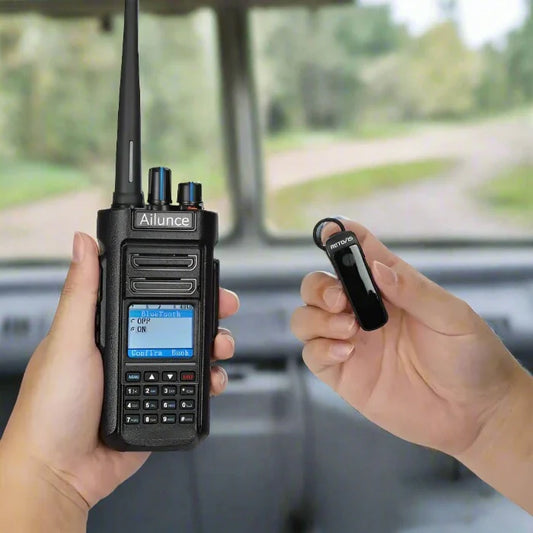 Black walkie-talkie and Bluetooth earpiece.