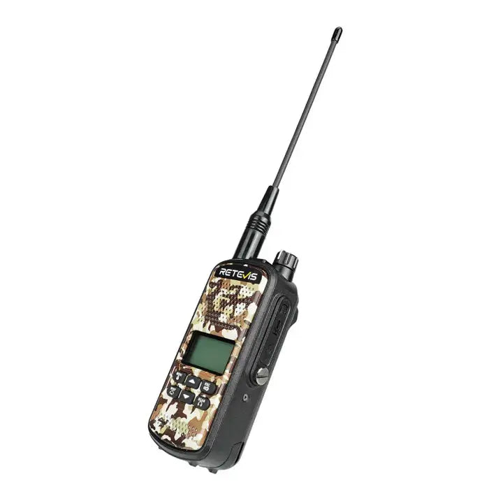 Camouflage two-way radio with antenna.