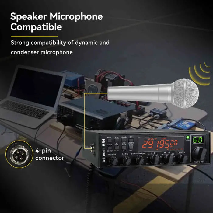 Black CB radio with microphone compatibility.