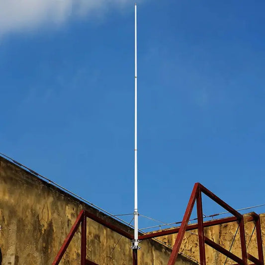 Tall white antenna.