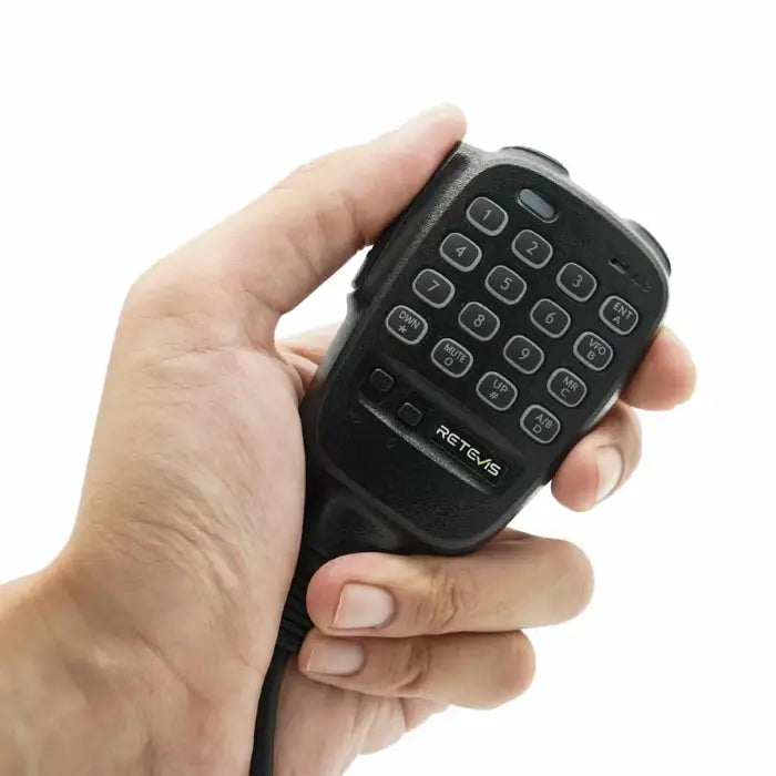 Black handheld microphone with keypad.