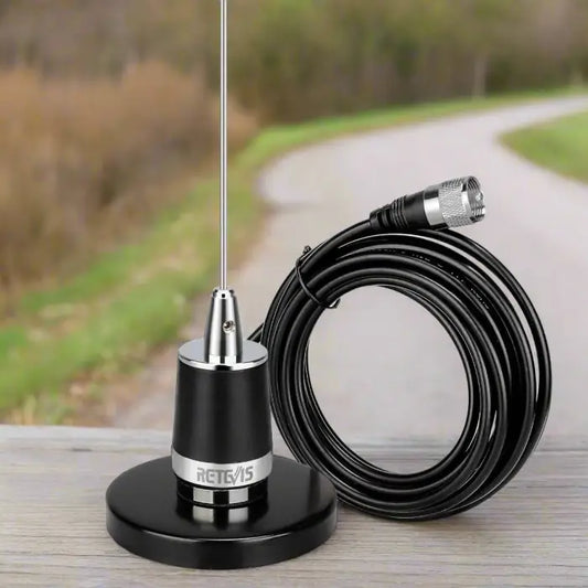 Black magnetic CB radio antenna with cable.