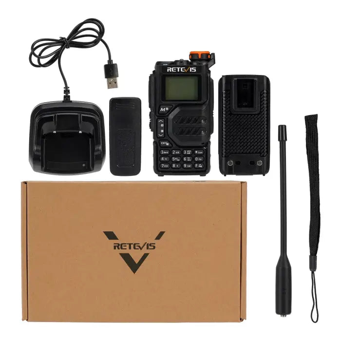 Black two-way radio with accessories.