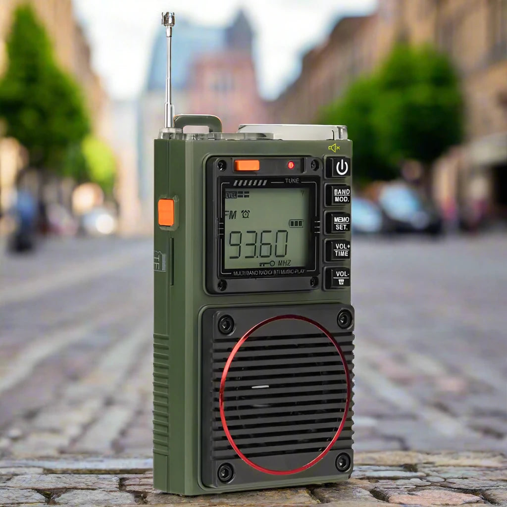 Olive-green portable radio with antenna.