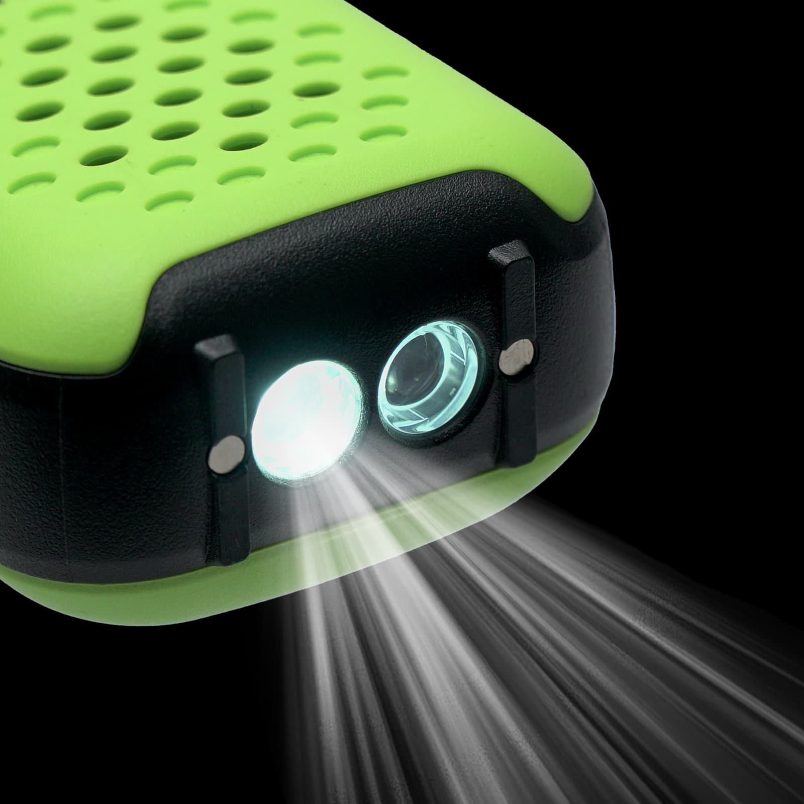 A green and black flashlight with two active lights, emitting bright white beams.