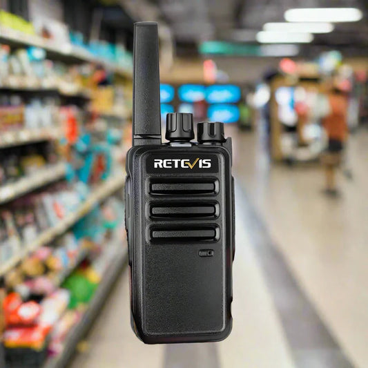 Black walkie-talkie with antenna.
