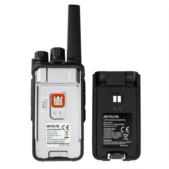 Two-way radio with detached battery.