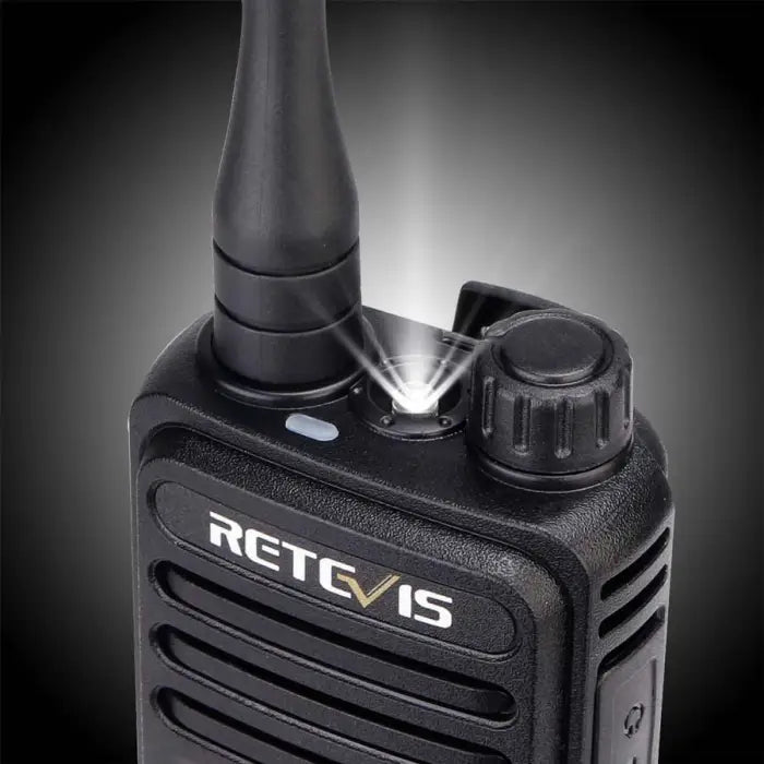 Handheld two-way radio or walkie-talkie with the brand name ’Retevis’ visible.