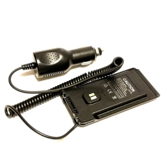 Car charger adapter for a mobile device or radio.