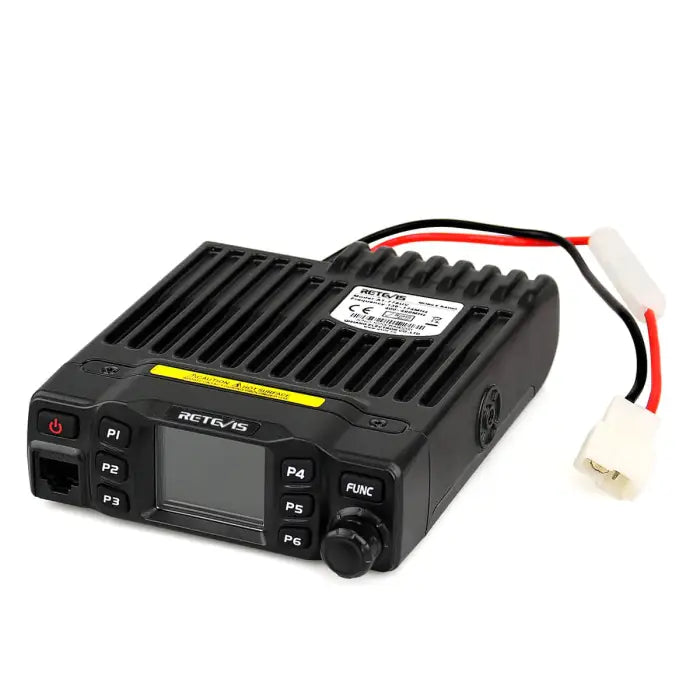 Black two-way radio with power cord.