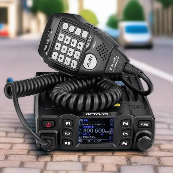 Black two-way radio with microphone.