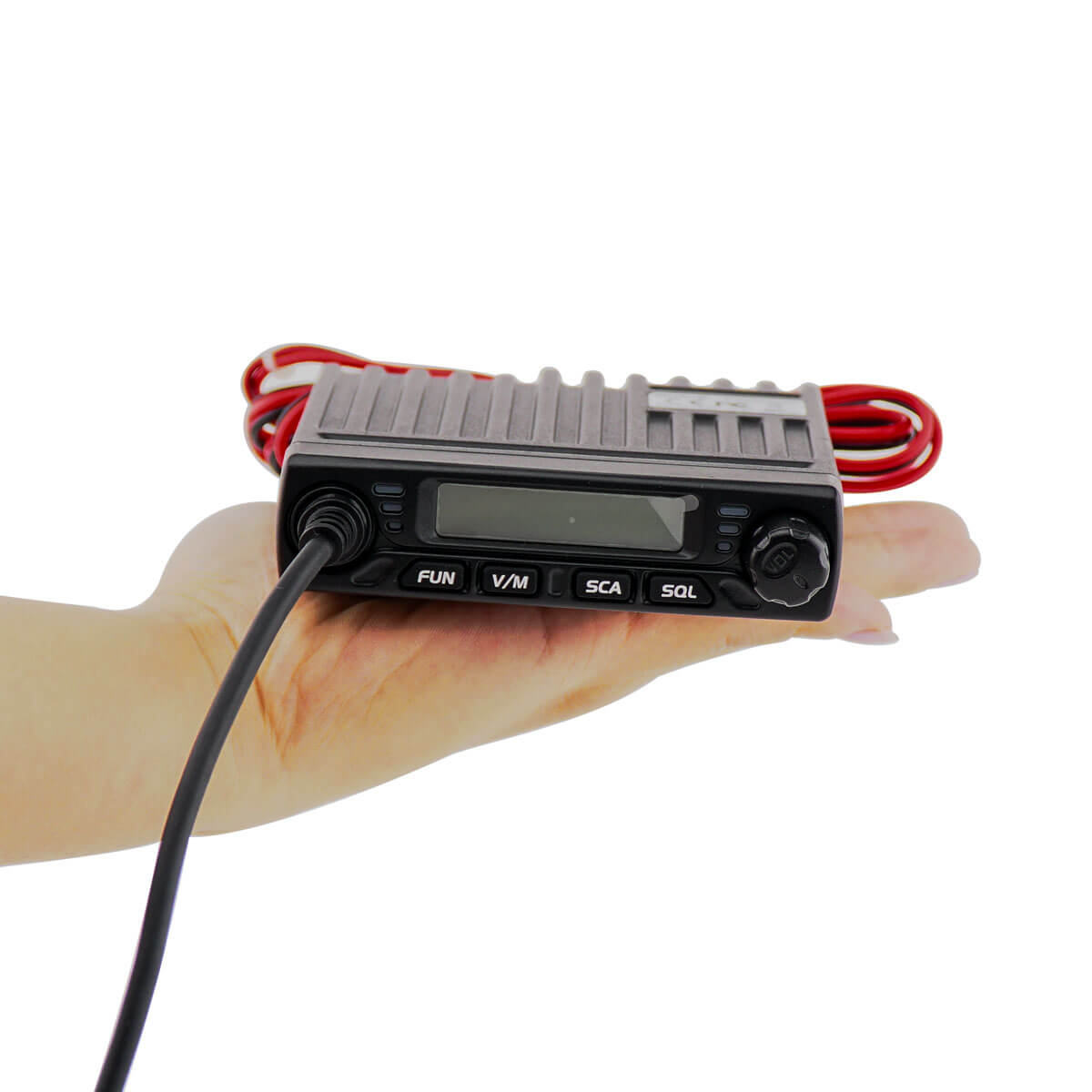 Gray CB radio with attached cords.