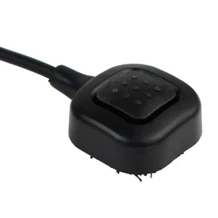 Black square foot pedal with textured button.