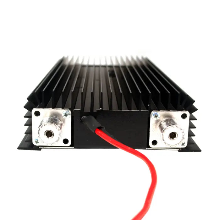 Black heat sink with connectors and red wire.