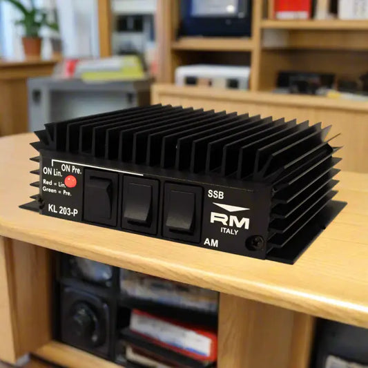 Black, finned, electronic amplifier.