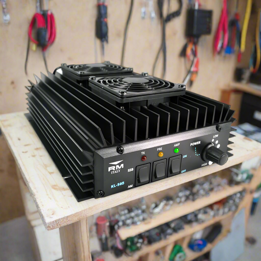 Black radio amplifier with cooling fans.