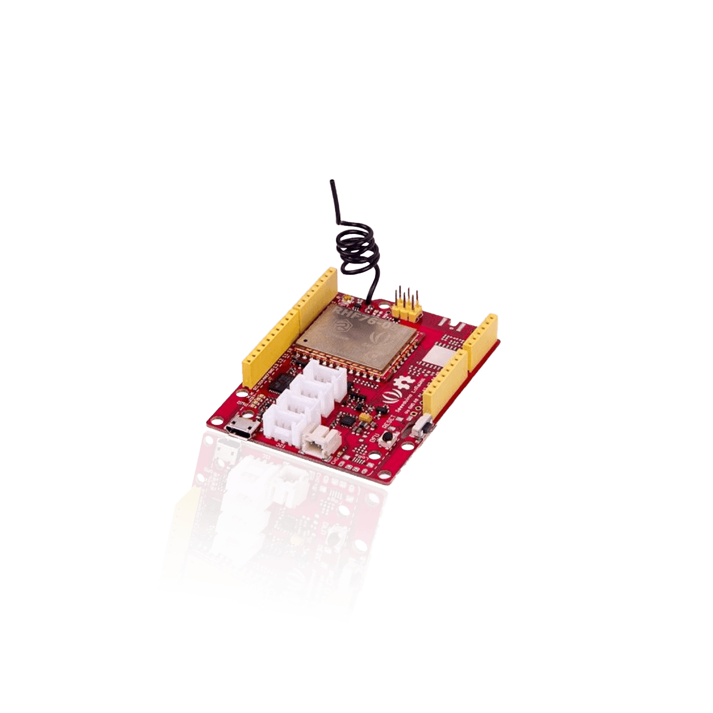 A red circuit board with multiple white connectors, yellow pin headers, and a coiled wire antenna.