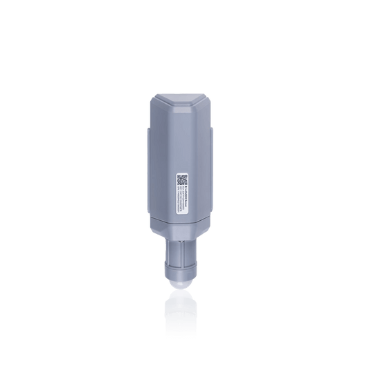 Gray cylindrical outdoor networking device with a mounting bracket.