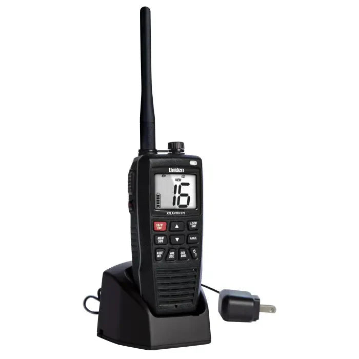 Black handheld marine radio with charging base.