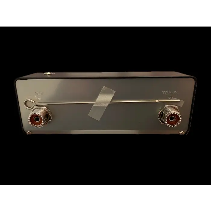 Rectangular electronic device with coaxial connectors.