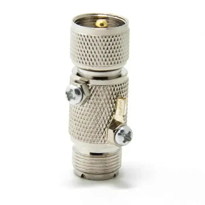 Silver-colored coaxial cable connector.