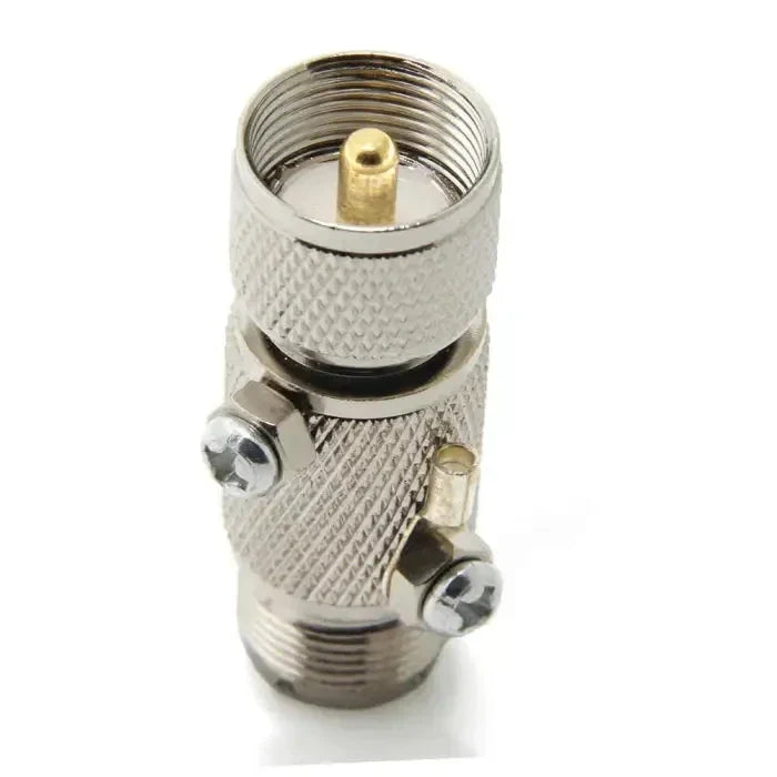 Silver-colored coaxial cable connector.