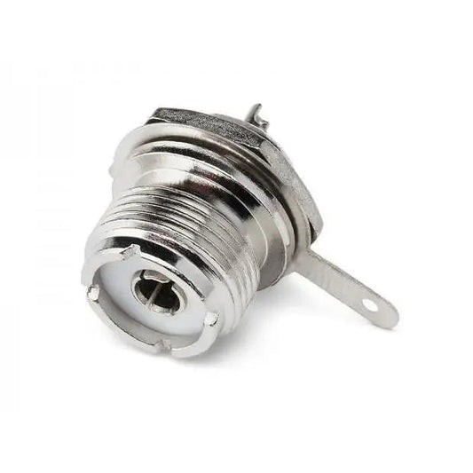 Silver-colored coaxial connector with mounting tabs.