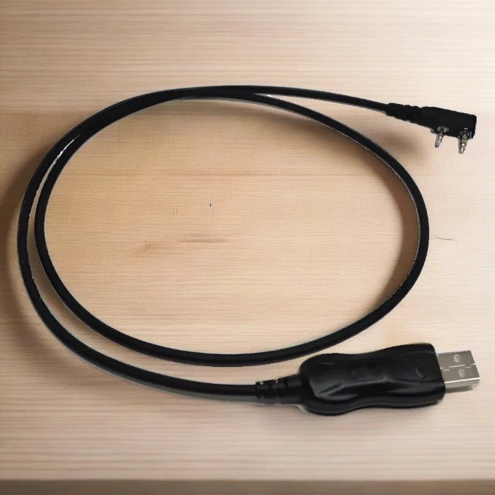 Black USB programming cable.